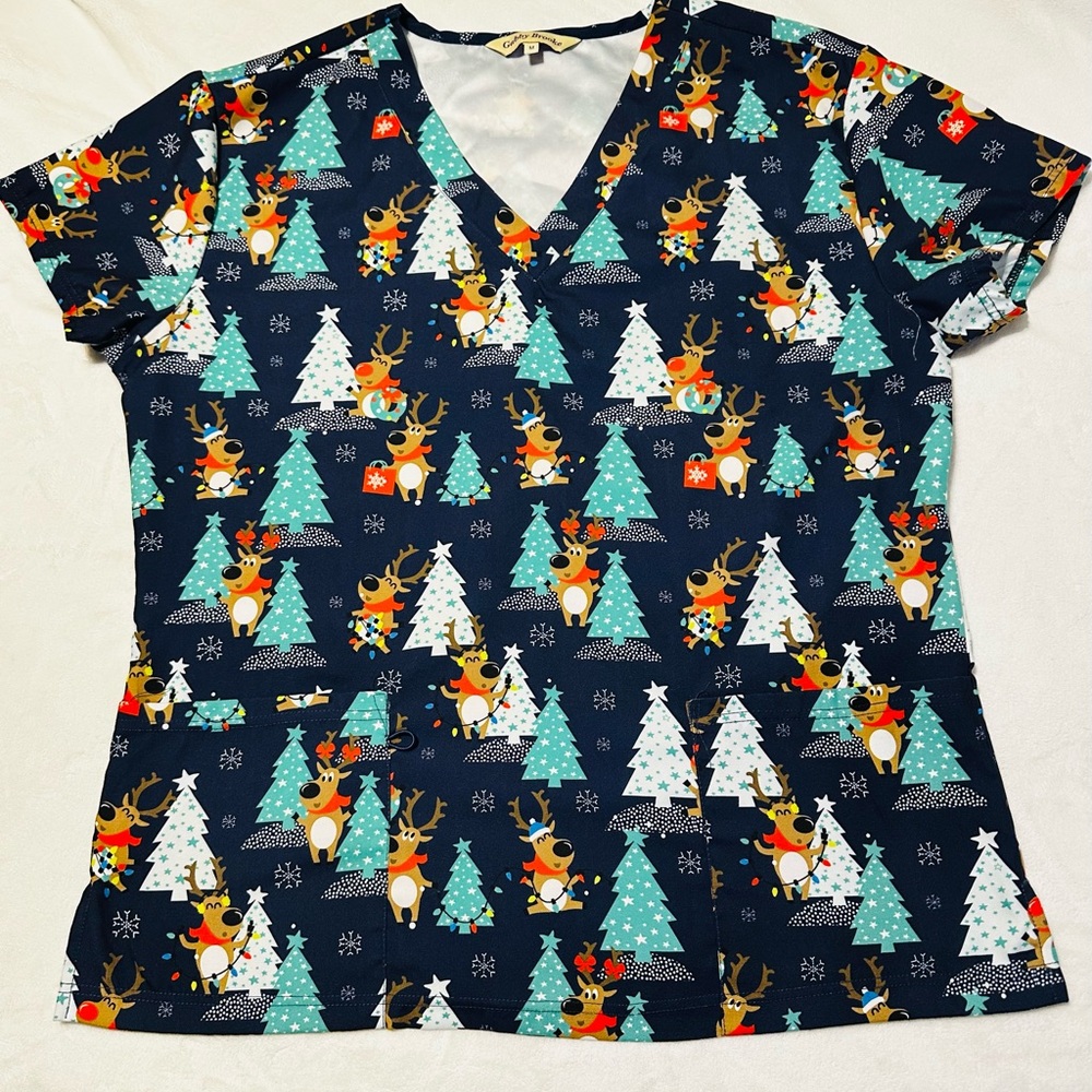 Women’s Navy V-Neck Holiday Reindeer Print scrub top